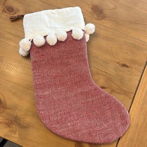 Red/ white herringbone stocking with white Pom poms